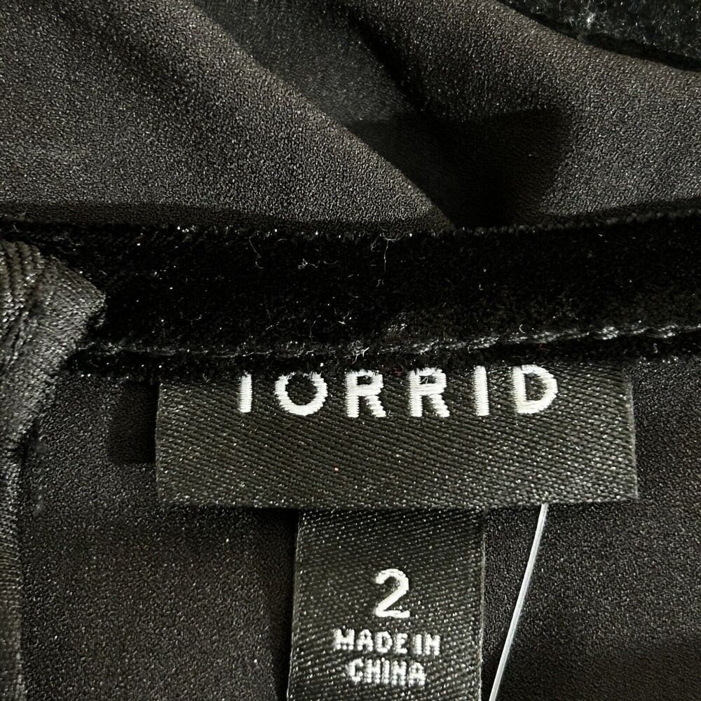 NWT TORRID Women’s Black Crepe Velvet Trim Asymmetrical Peplum Top Size 2X - Picture 10 of 12